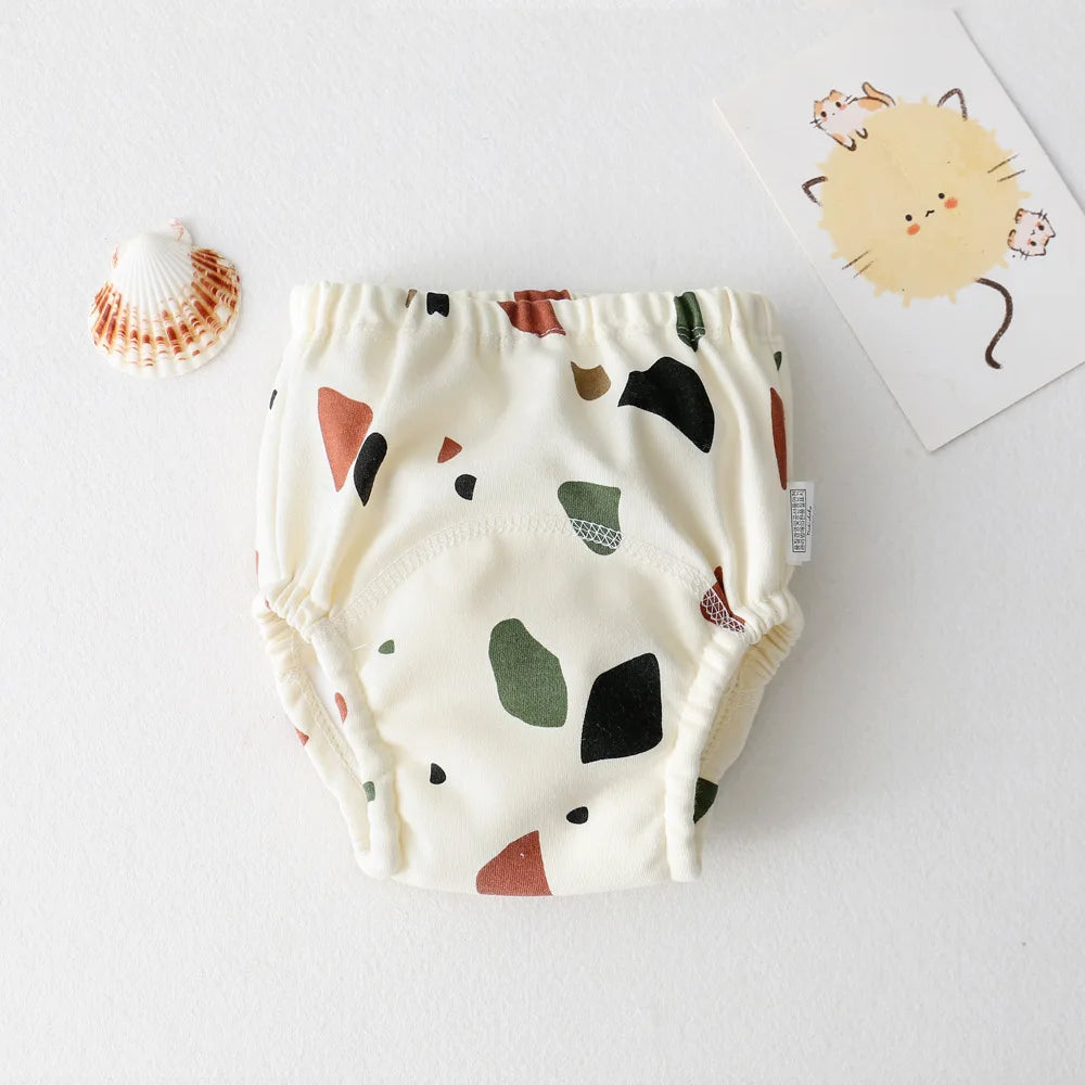 Baby bloomers with abstract pattern on a white background