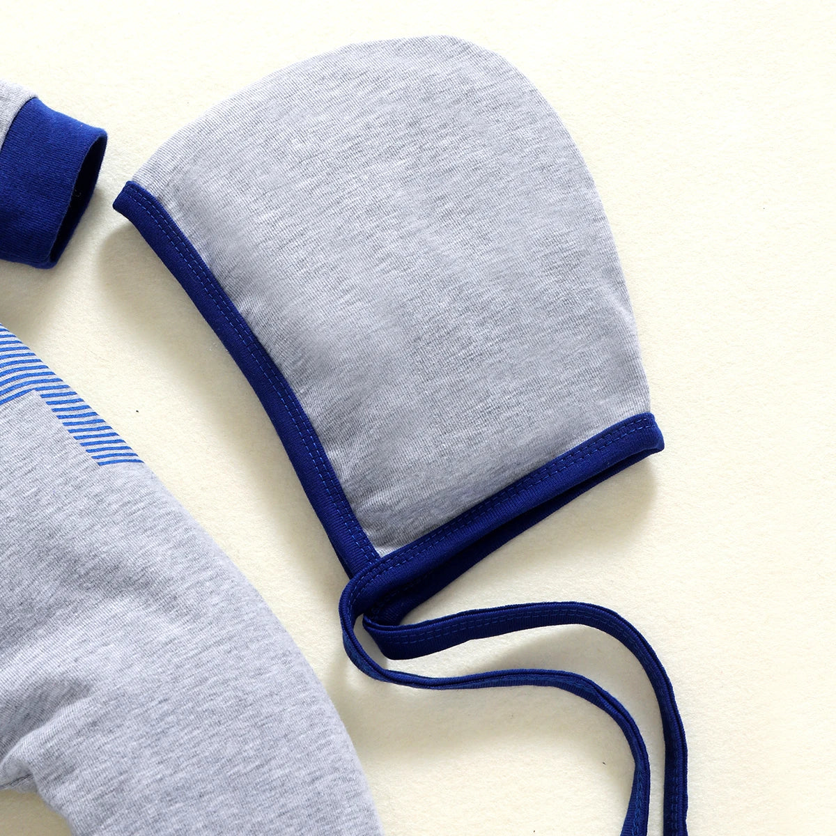 Gray-blue footed onesie