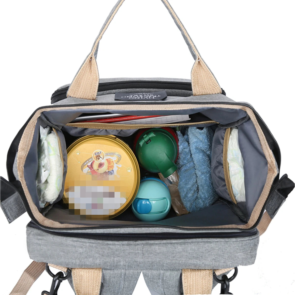 Foldable bed diaper bag with changing station