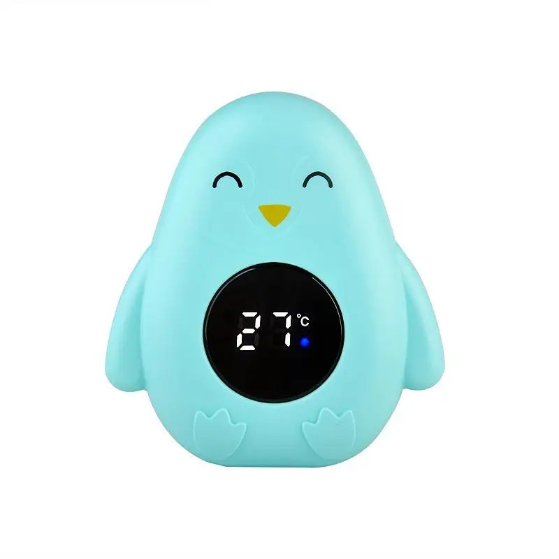 Blue penguin-shaped thermometer with a digital display on a white background